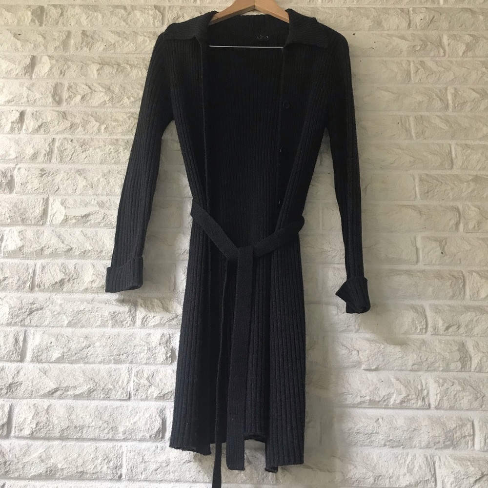 Women’s long black belted sweater.